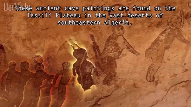 These ancient cave paintings are found on the Tassili Plateau in the vast deserts of southeastern Algeria.