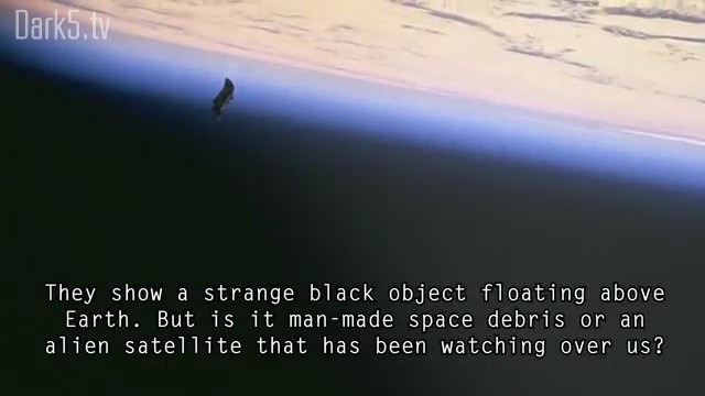 They show a strange black object floating above Earth. But is it man-made space debris or an alien satellite that has been watching over us?
