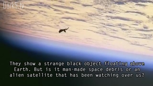 They show a strange black object floating above Earth. But is it man-made space debris or an alien satellite that has been watching over us?