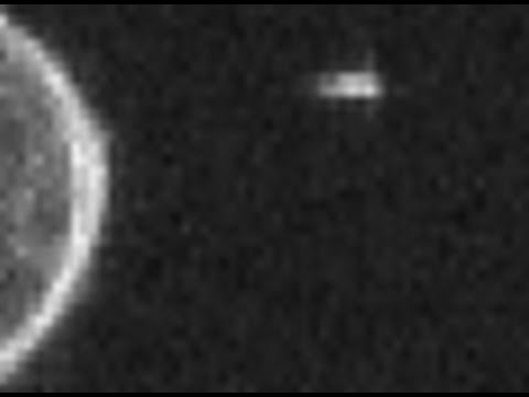 UFO Trails Asteroid In NASA Photo During Near-Miss Of Earth
